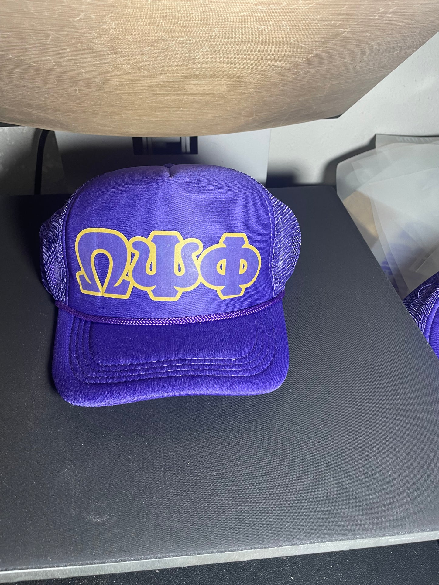 Omega Psi Phi trucker hat